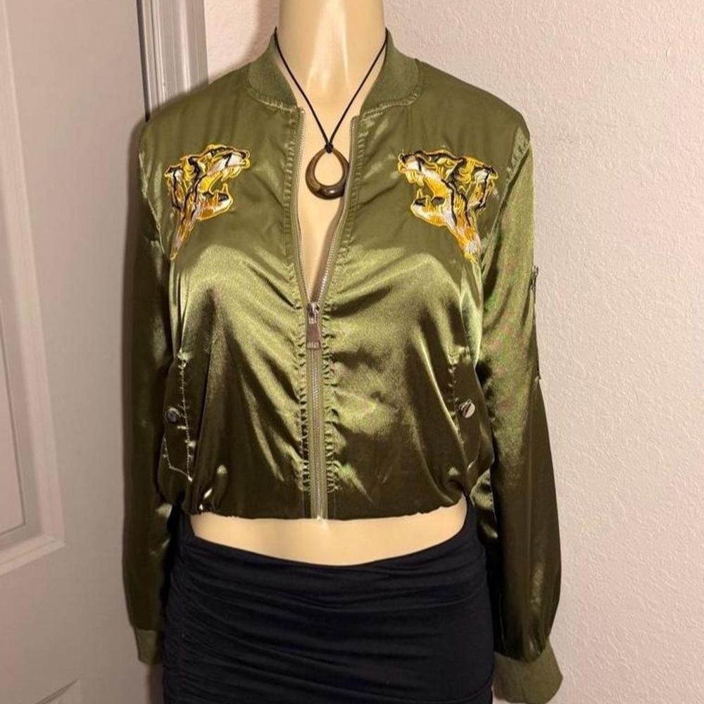 Green bomber jacket with yellow tiger embroidery